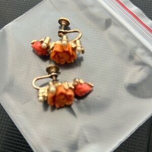 Coral colored clip earrings